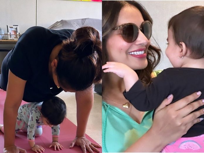 Bipasha Basu shares picture of doing yoga with daughter Devi